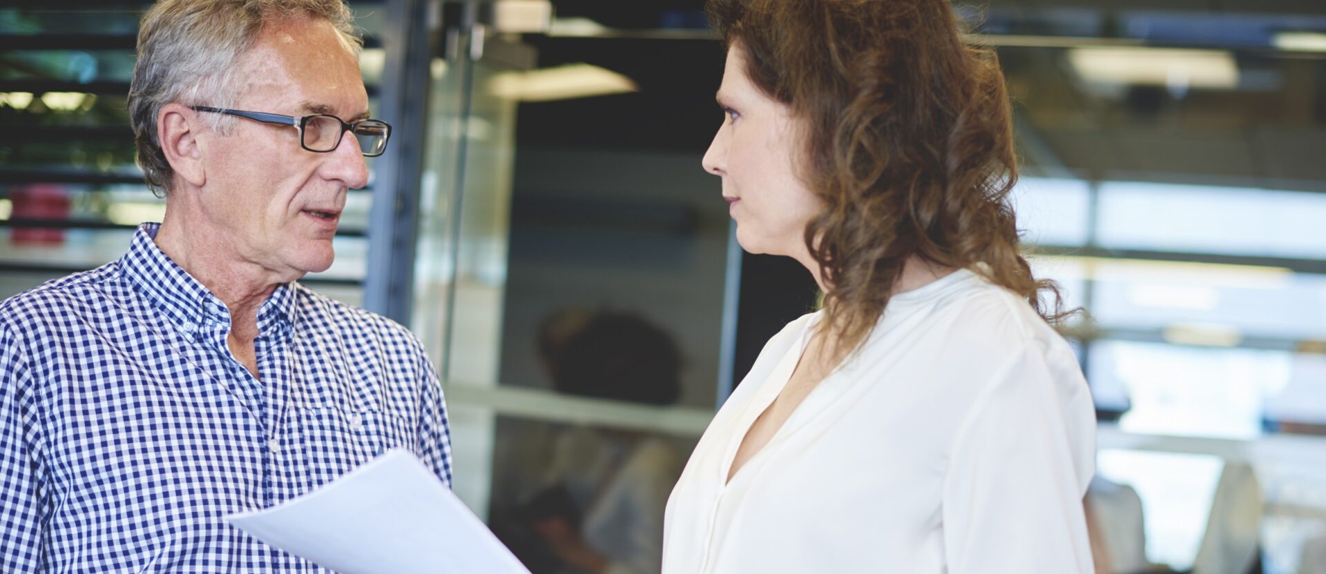 Business woman explaining project to colleague